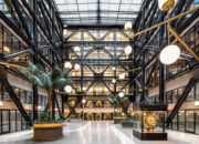 Contemporary building interior featuring exposed structural elements and natural light.