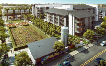 A sustainable urban development featuring multi-story residential buildings, an agricultural field, and shared communal areas.